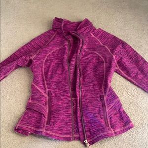 purple zip up lulu lemon sweater. ruffle back